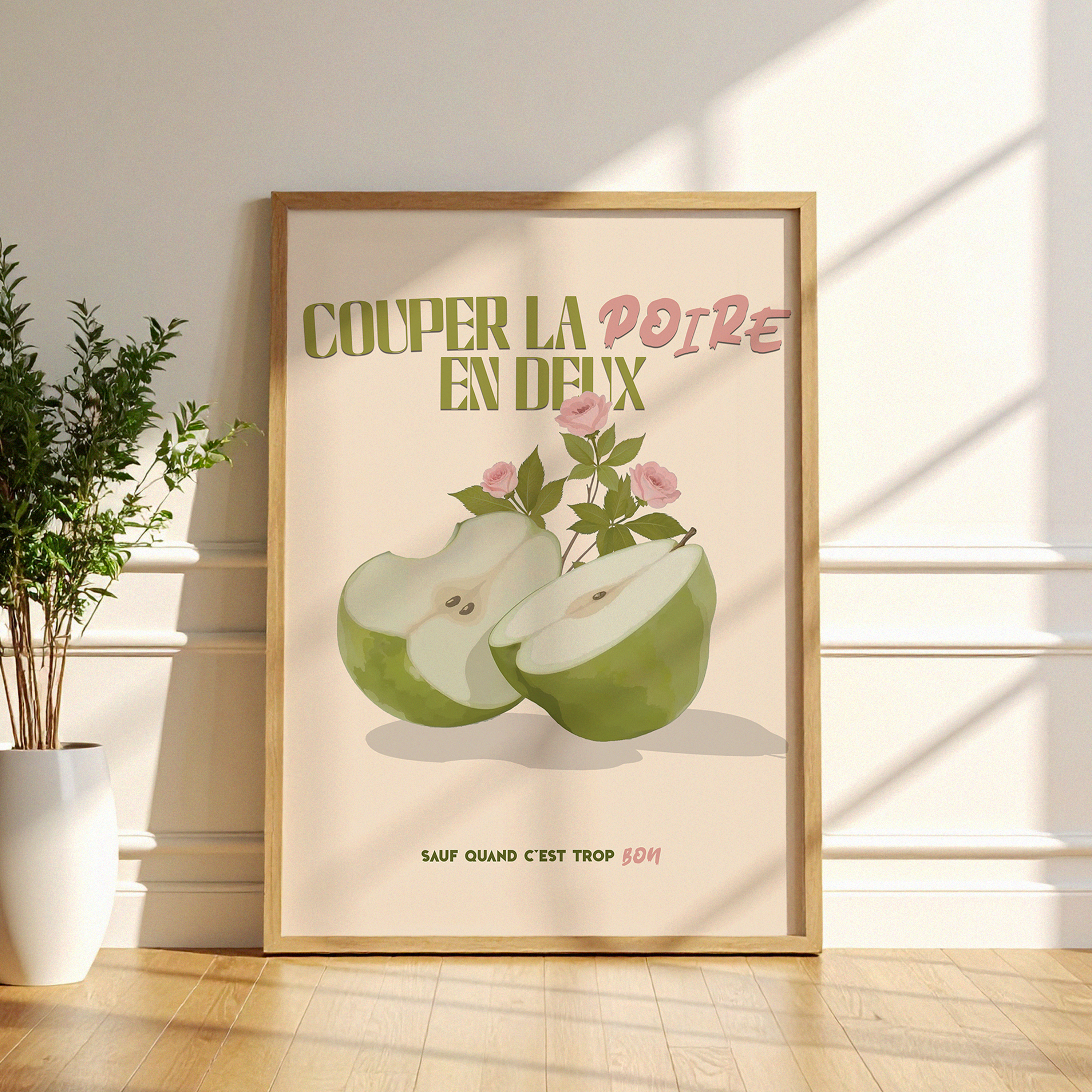 Affiche déco humoristique “Couper la poire en deux” avec une illustration de poire verte coupée en deux et des roses, style vintage moderne, idéale pour décoration murale cuisine, salon ou bureau.