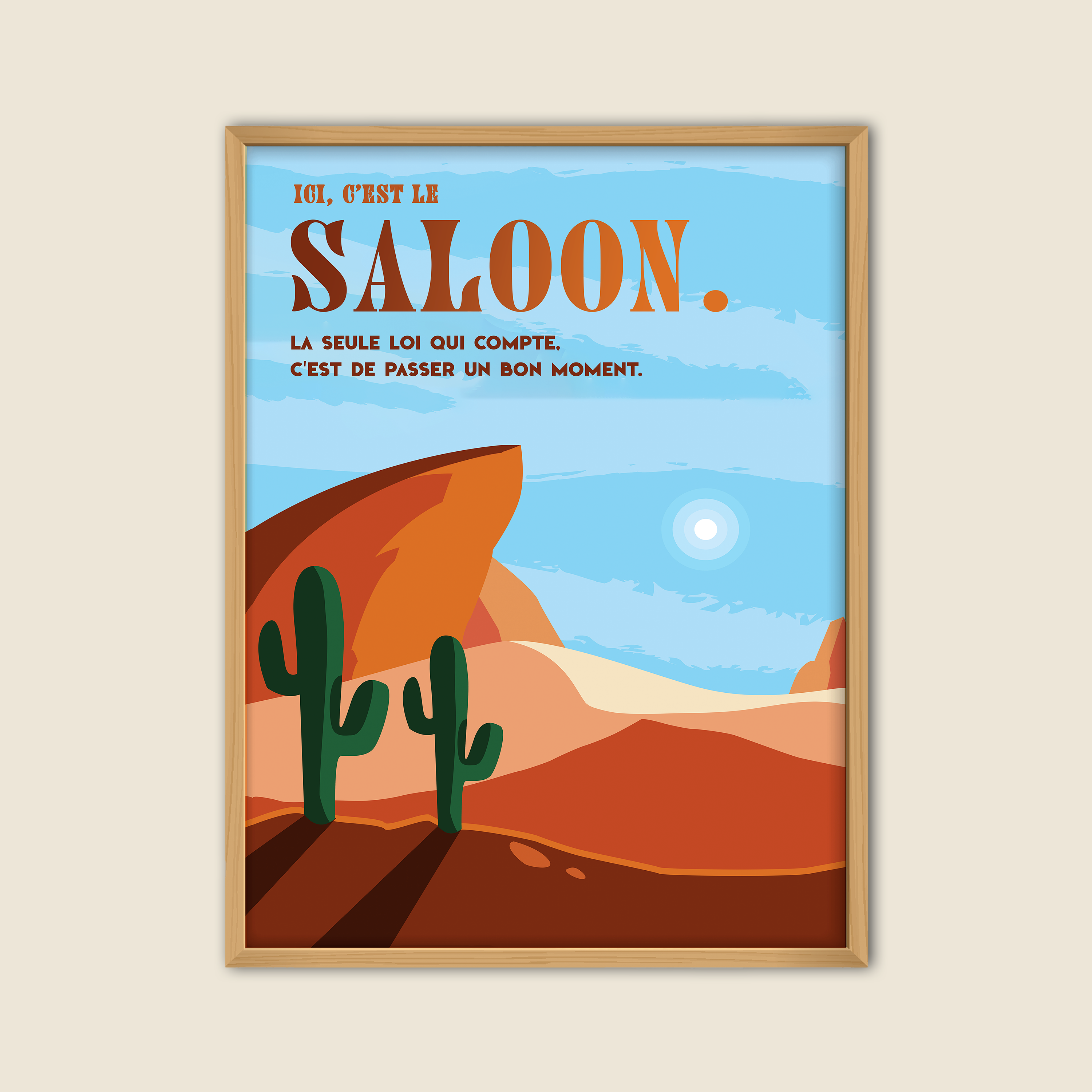 Affiche déco style western avec désert, cactus et rochers rouges, inscription “Ici, c’est le saloon. La seule loi qui compte, c’est de passer un bon moment.”, décoration murale vintage Far West pour salon, bar, bureau ou salle de jeux.