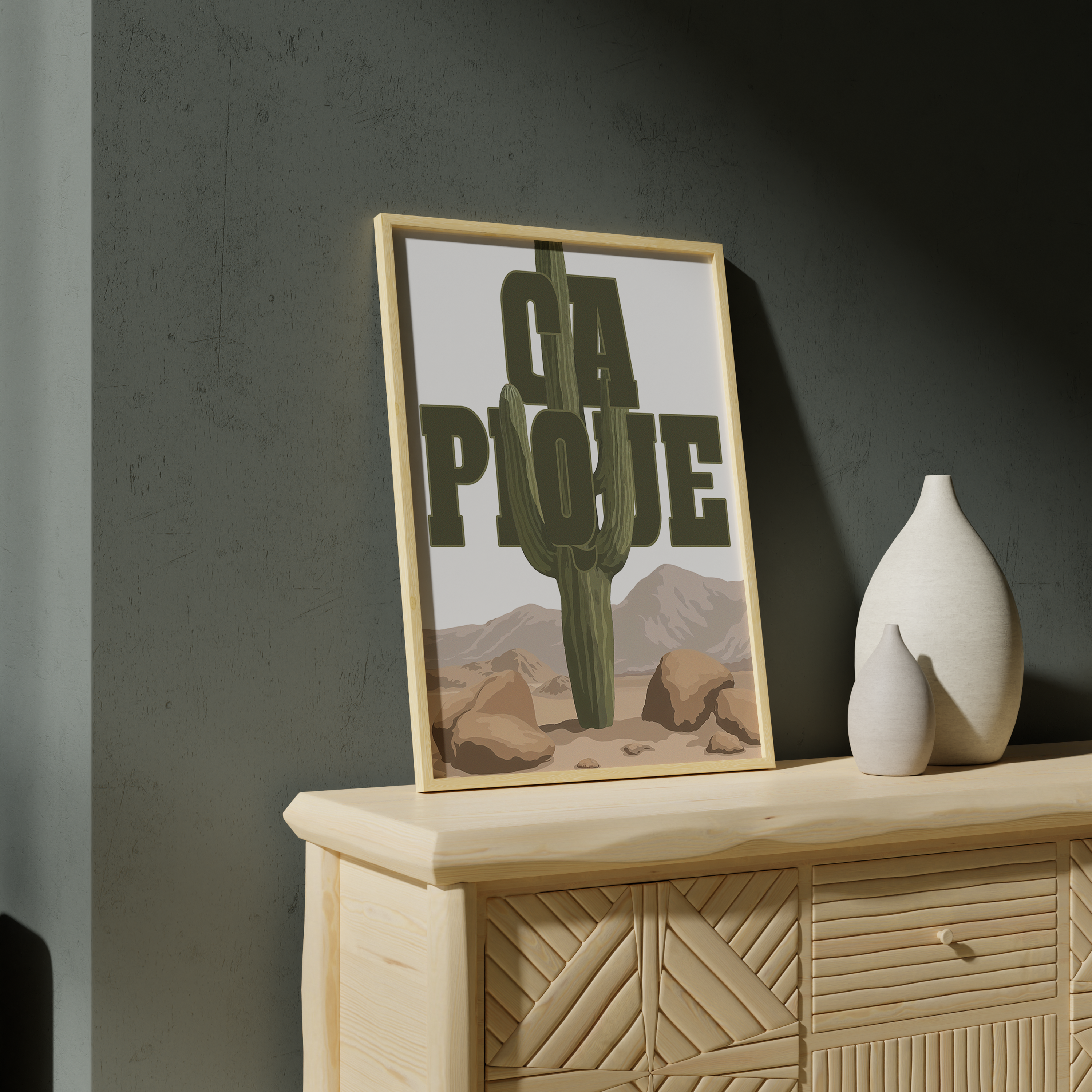 Affiche décorative humoristique "Ça pique" avec un grand cactus vert traversant une typographie imposante dans un paysage désertique avec montagnes et rochers, style graphique vintage, idéale pour une décoration murale originale et décalée.