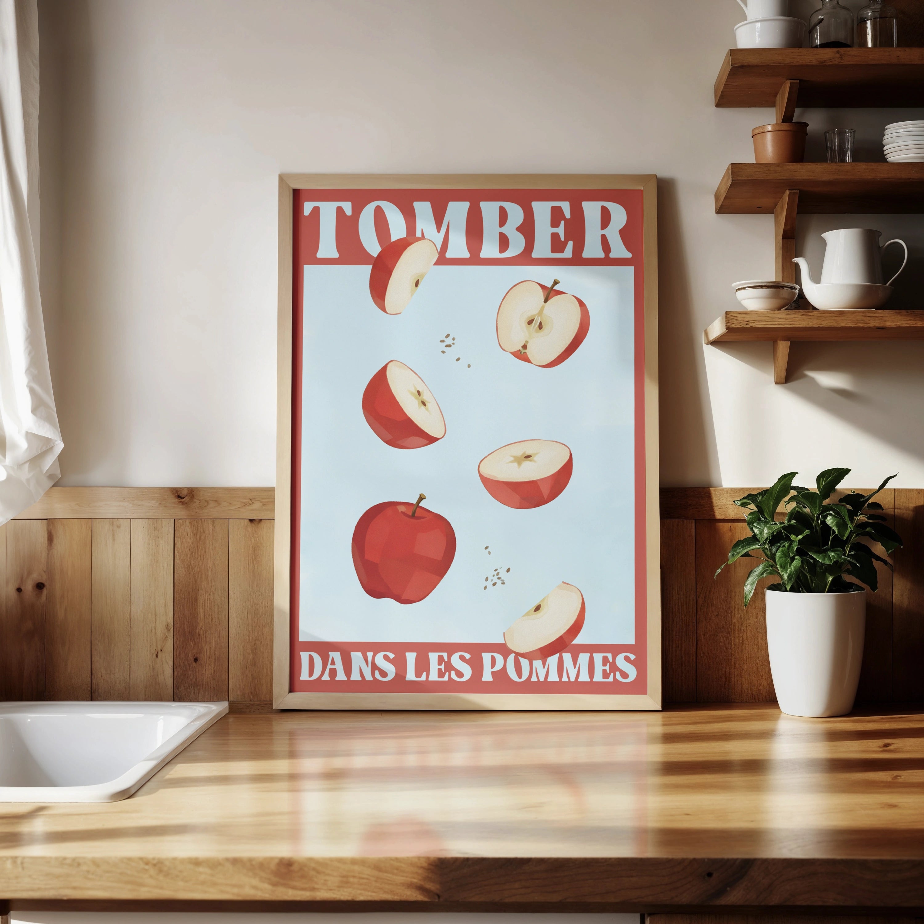 Affiche illustrée avec des pommes rouges en chute libre, accompagnée du texte français 'Tomber dans les pommes', une expression idiomatique signifiant s’évanouir. Illustration humoristique sur fond bleu clair, encadrée de rouge, parfaite pour une décoration murale ou une communication visuelle en lien avec la langue française ou les expressions idiomatiques.